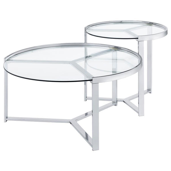  and pleasing. Your living room or family room comes to life with a table set including one large and one small round table that display side by side and nestle together 