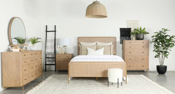 Create an elegant retreat with this mid-century modern bedroom set, featuring a wire-brushed, sand wash finish across its woven cane panel bed and matching pieces. Woven cane panels offer a vintage feel along with soft, curved corners and lustrous aged br