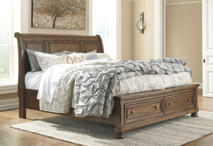 A fresh, new take on traditional style. This California king sleigh bed meets todayâ€™s design tastes with beauty and grace. Tobacco brown finish allows the natural grain of the acacia veneers to show through in an organic way. Aged brass-tone knobs dress