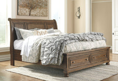 A fresh, new take on traditional style. This king sleigh bed meets todayâ€™s design tastes with beauty and grace. Tobacco brown finish allows the natural grain of the acacia veneers to show through in an organic way. Aged brass-tone knobs dress the fronts