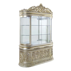 Create an eye-catching functional focal point of opulence with the Sorina curio cabinet that is grand, yet charming and approachable. Finished in gold and silver, the cabinet glistens with a touch of glam, featuring a mirrored back panel and a top crown. 