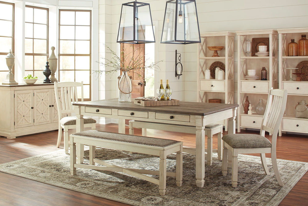 Unique two-tone finish with a combination of Oak and Acacia substrates combining a trendy textured antique white color with table and server tops finished in a textural weathered oak finish. Rectangular dining table features six convenient drawers for sto