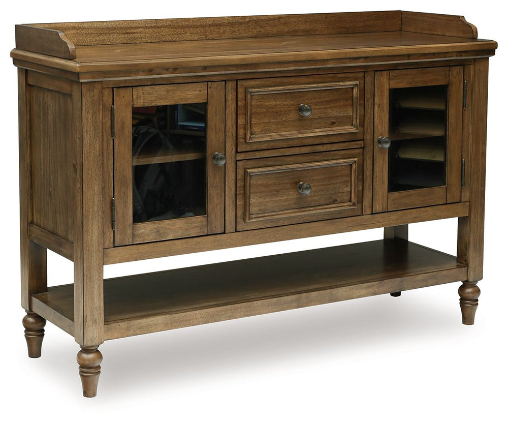 Traditional style doesnâ€™t have to be stuffy. It can feel warm, inviting and beautifully in the moment. Case in point: this dining server. It-'s ready to stand in as an entertainment center, entryway storage or a console table, with a profiled top and gl