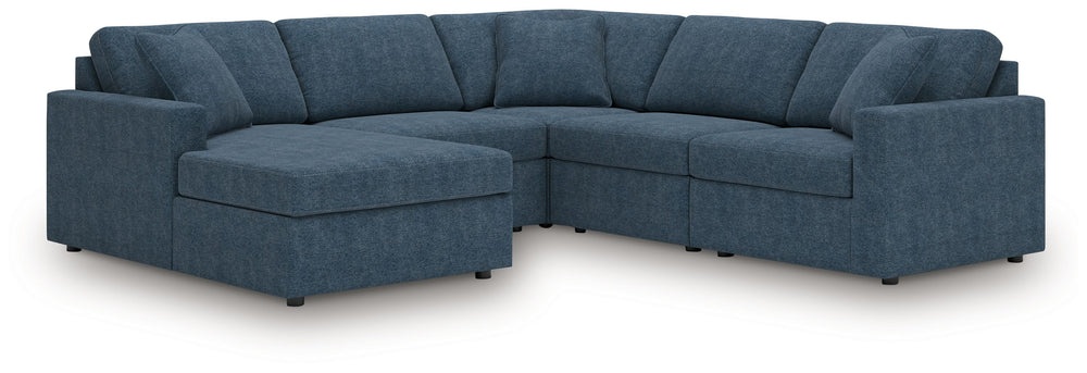 Looking cool and contemporary is great. But when it comes down to it, youâ€™re all about low-maintenance lounging. With the performance fabric on this sectional with chaise, cleaning spills is a breeze. And its customizable modular design caters to your e