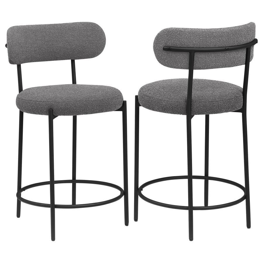 Your kitchen island or counter table gets an instant upgrade with this set of two modern barstools. The pair features contemporary boucle upholstery in a neutral hue over foam cushions for comfort. Metal framing features a black finish and provides excell