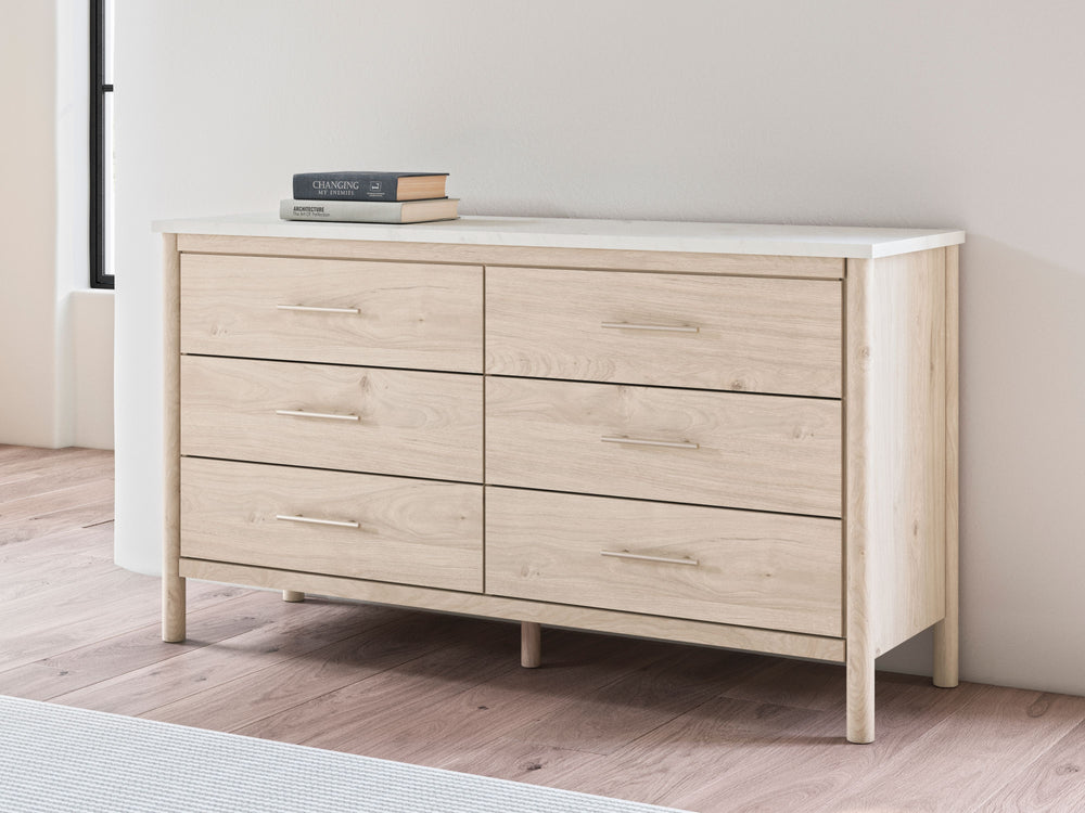 Transform your bedroom with this dresser. With its clean lines and replicated marble top, it exudes a minimal and sophisticated boho style. Tailor your space and create the perfect environment for sweet dreams.<br><br><b>Additional Dimensions</b><br><ul><