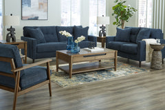 Feed your mid-century modern nostalgiaâ€”with a contemporary twist. A vibrant trend-right hue and comfy feel make this living room set perfect for lounging solo or with friends and family. Its linear profile adds plenty of fresh style, and the tapered acc