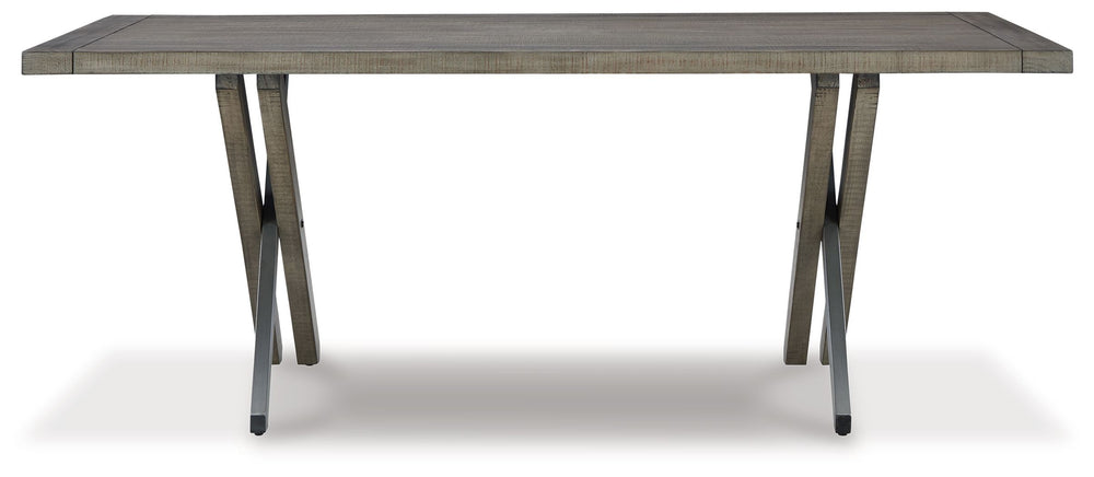 The use of mixed materials on this urban-inspired dining table makes it a true statement piece. Featuring a wood tabletop combined with a sturdy wood and metal base, this rectangular table combines a complex blend of stains and glazeâ€”creating a weathere