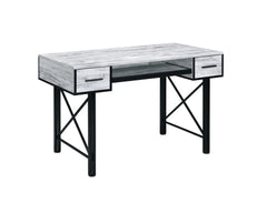 The Settea Desk bring a mix-and-match look with distressed casegood and black metal frame. Found atop a double pedestal base, It is accented with metal trim and -"X-" shpaed support for industrial details. The rectangular table is designed for a spacious 
