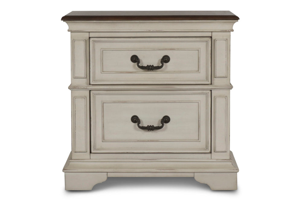 Complete your bedroom ensemble with the New Classic Furniture Anastasia 2 Drawer Nightstand. Crafted with real wood construction from solid poplar and oak veneer, this nightstand ensures long-lasting durability. The heirloom finish, achieved through a mul