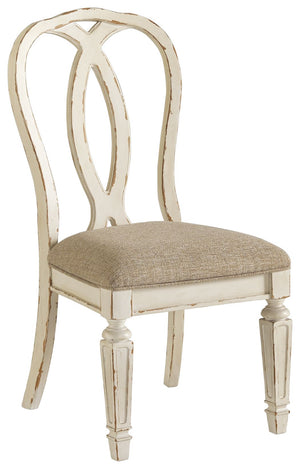 French twist. With its stylized ribbon back, chipped white finish and plushly cushioned seat, this dining room chair has all the right ingredients for a French country-inspired feast for the eyes.<br><br><b>Additional Dimensions</b><br><ul><li>Seat width:
