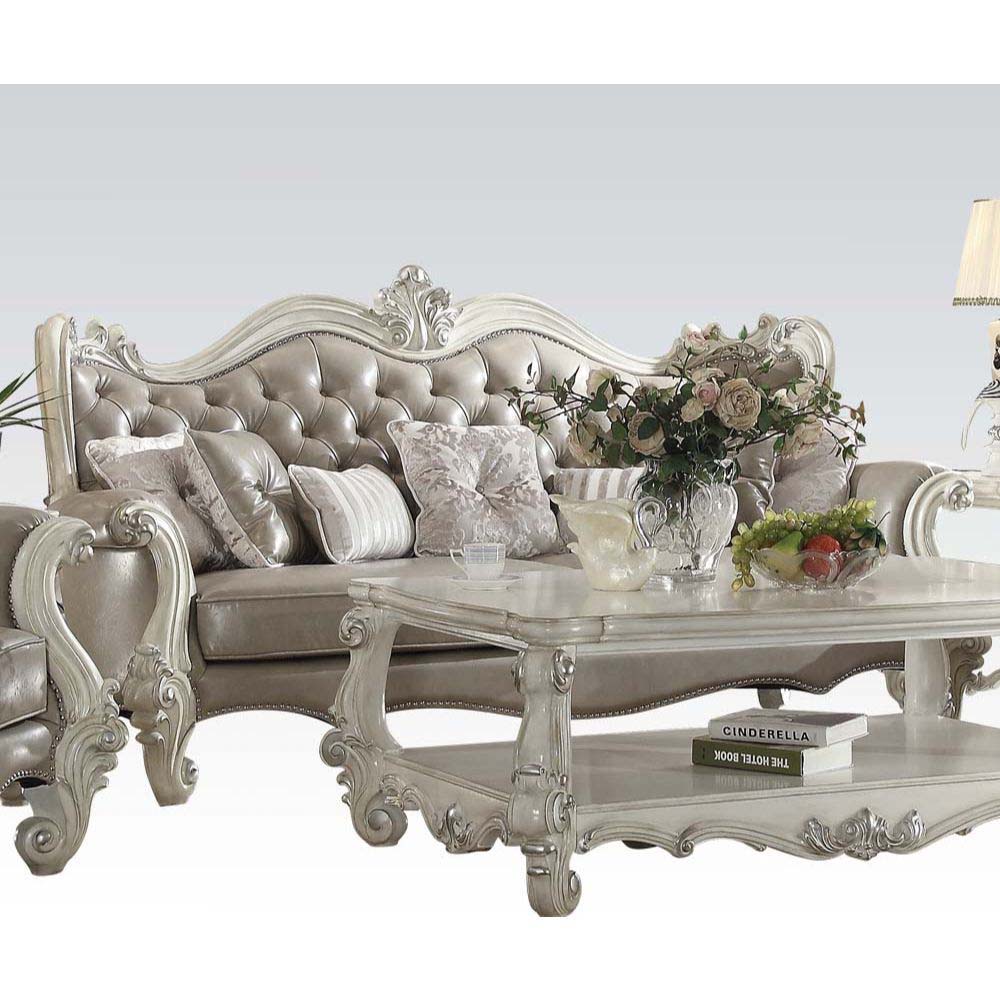 Assembled, w/7 Pillows Tight Back & Loose Seat Cushion 2 Seat Cushion Reversible?? w/Welted Edge Button Tufted/Curved Back Rolled/Flared Armrest Curved/Scrolled Trim: Full Back/Crown/ Legs: Poly Resin Ornamental Details in Front Arms & Base w/Nailhead Tri
