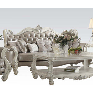 Assembled, w/7 Pillows Tight Back & Loose Seat Cushion 2 Seat Cushion Reversible?? w/Welted Edge Button Tufted/Curved Back Rolled/Flared Armrest Curved/Scrolled Trim: Full Back/Crown/ Legs: Poly Resin Ornamental Details in Front Arms & Base w/Nailhead Tri