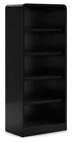 Inspired by art deco design, this softly shaped bookcase makes a lasting impression in a simply stunning way. Its magnificent curved silhouette is enhanced by a rich layered black finish on the textured wood grain surface. Complete with shelves to display