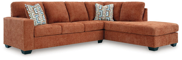Looking to make a bold statement with color? Liven up your living room with this sectional with chaise. Its trend-right burnt orange upholstery adds a playful pop of color to your decor. Bold and eclectic accent pillows complete the look. Pairing posh sty