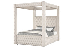 This majestic four-poster bed is a statement piece that exudes luxury and grandeur, perfect for creating a dramatic bedroom setting. It boasts a creamy ivory finish that encapsulates modern opulence, while its sumptuous, tufted headboard and footboard are