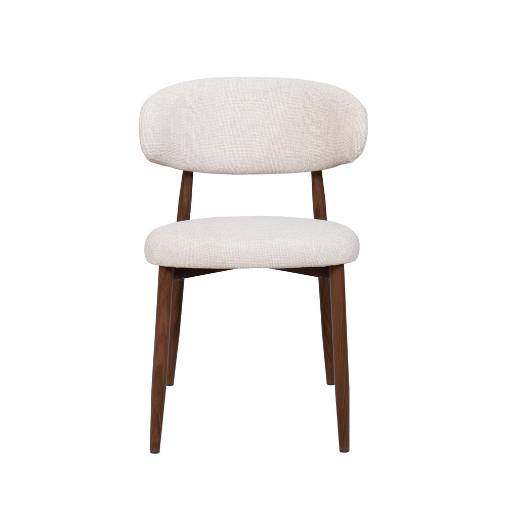 The Royce Side Chair set offers a stylish and practical seating solution with a distinct mid-century modern flair. Each set includes two side chairs featuring a gracefully curved back and sleek, low-profile design that adds a refined touch to any dining o