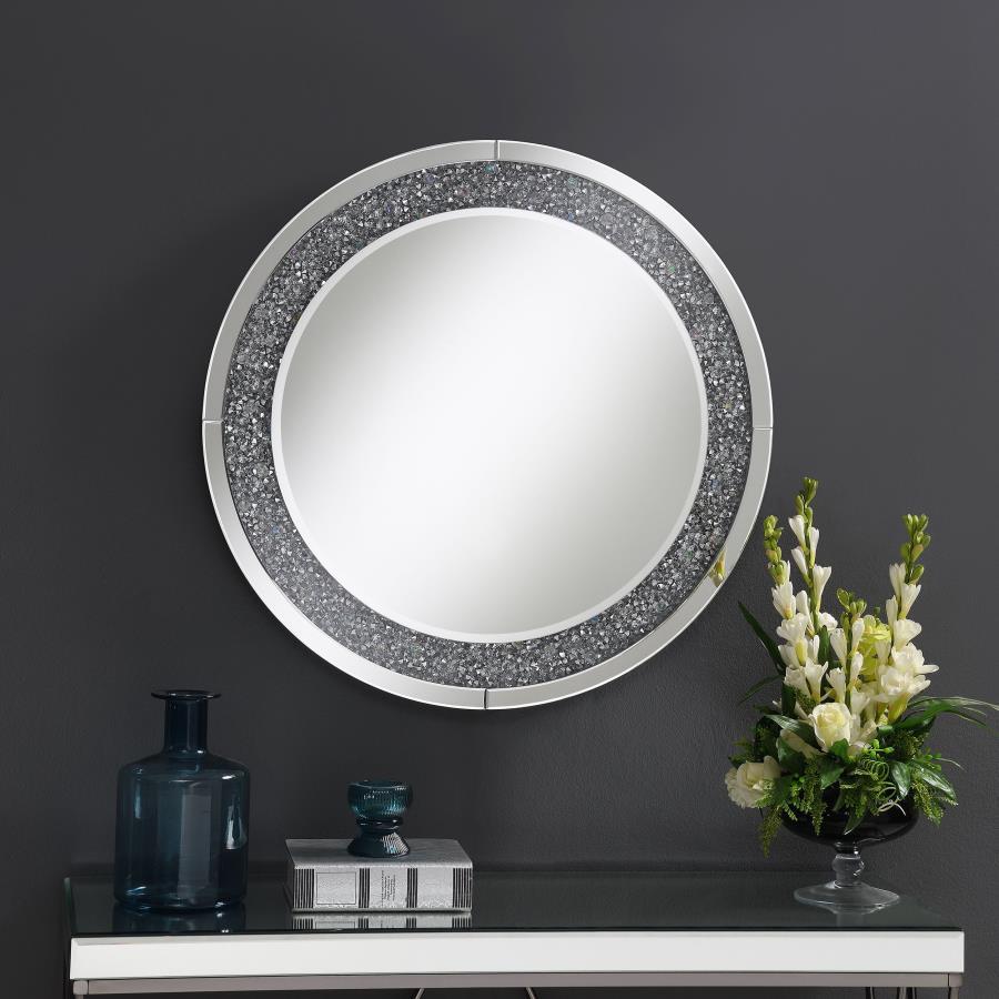 Accentuate your home with this cool, lively decorative wall mirror. The MDF and mirror construction brightens up a front hallway or walk-in closet. The silver hardware finish is highlighted by brilliant crystal accents that deliver glitz and glam. There-'