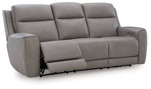 Masterfully blend high style and must-have comfort with this power reclining sofa. Its clean, transitional look is crafted with luxury in mind, complete with supple top-grain leather in the seating area. Eloquently incorporated into the sleek design are f