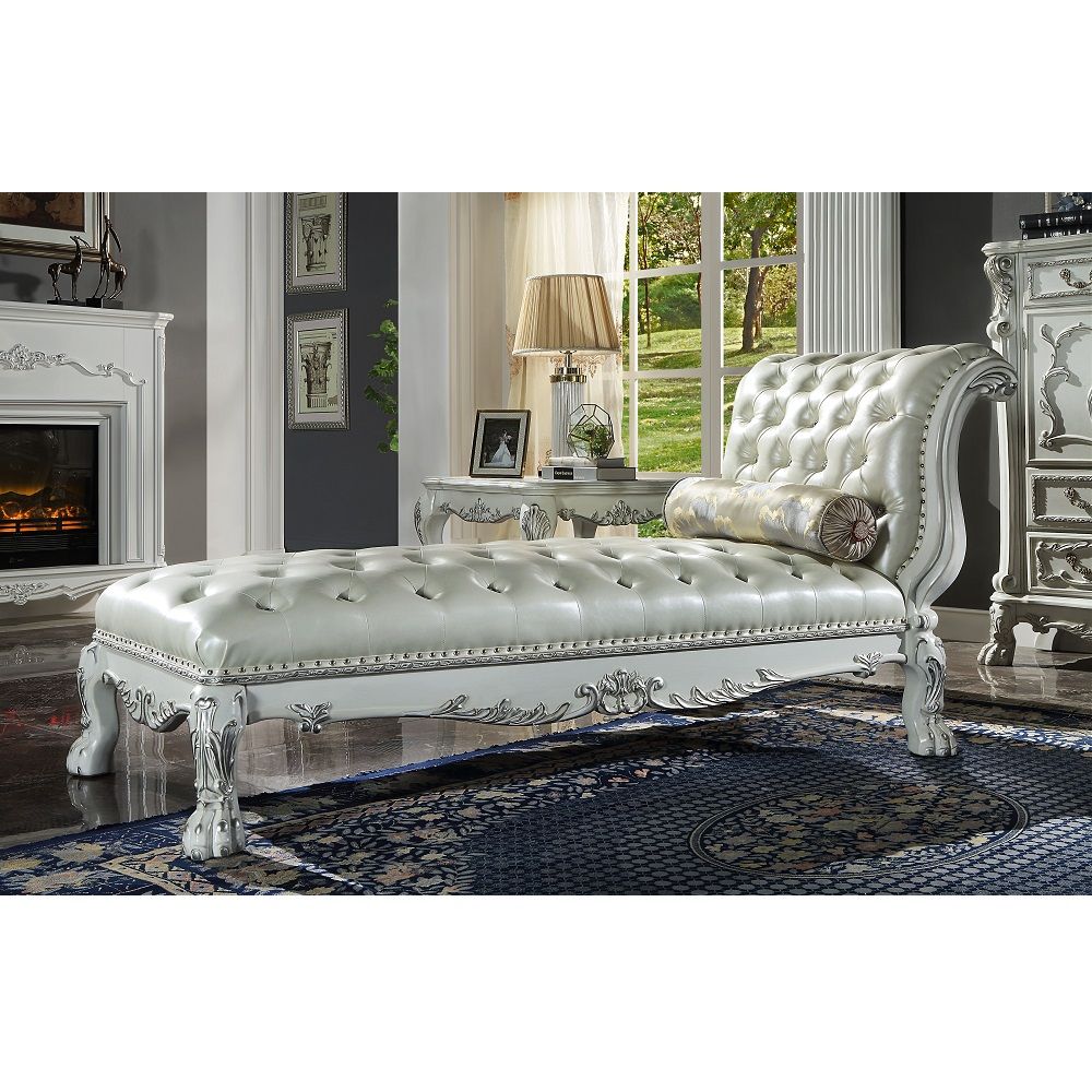 Add old world charm in your home with the Desdren chaise lounge. It takes inspiration from a Victorian Era fainting couch with its immaculate features. The bone white finish and PU upholstery compliment the beautiful moldings. The moldings have hand-brush