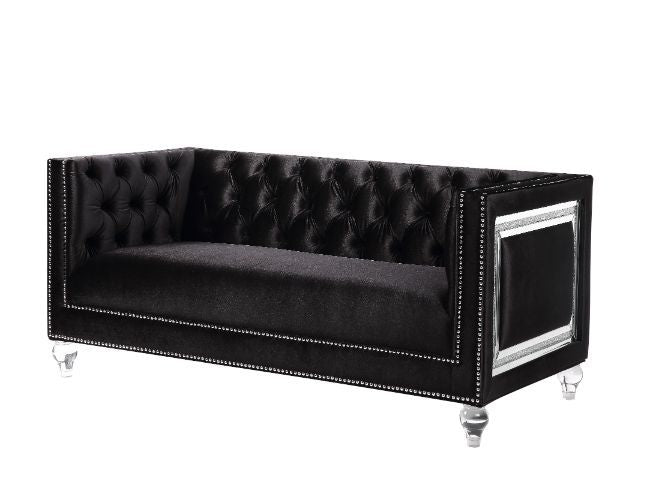 Looking to create a glamorous living room, look no further. The Heibero collection is ideal for that. Featuring timeless button tufting and the more modernized fine details such as the mirrored trim accents. The burgundy velvet upholstery is an eye-catche