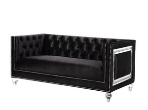 Looking to create a glamorous living room, look no further. The Heibero collection is ideal for that. Featuring timeless button tufting and the more modernized fine details such as the mirrored trim accents. The burgundy velvet upholstery is an eye-catche