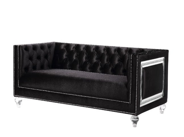 Looking to create a glamorous living room, look no further. The Heibero collection is ideal for that. Featuring timeless button tufting and the more modernized fine details such as the mirrored trim accents. The burgundy velvet upholstery is an eye-catche