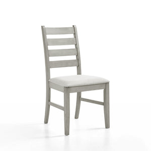 Enhance your dining experience with the Pascal Ladderback Dining Chairs in Driftwood Gray. This set of two chairs is crafted from solid Rubberwood, ensuring long-lasting durability and stability. The chairs feature side stretchers for added strength, maki