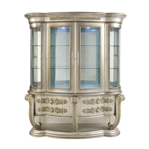  including a decorative base and drawer fronts. Dis