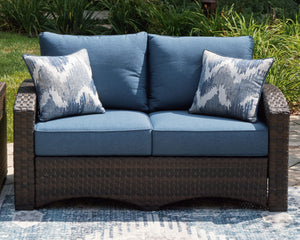  this loveseat is the perfect addition to any outdoor setting. Its all-weather resin wicker