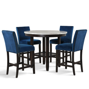 The Celeste 5-Piece Counter Dining Set is an exquisite combination of modern sophistication and enduring craftsmanship. This set includes a chic 42-inch counter table with an espresso base and a faux marble top, accompanied by four stunning blue velvet ch