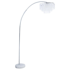 Blend beautiful shapeliness and soft curves with modern and classic materials in this brilliant floor lamp. Designed to light up any space, as well as your sense of aesthetics, this drooping floor lamp has eye-catching appeal. The lamp is anchored by a ma