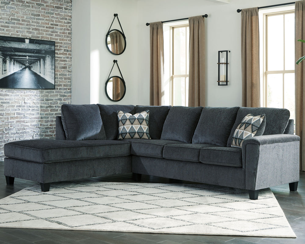 If youâ€™re looking for a smokin-' hot look priced to entice, youâ€™re sure to find this budget-conscious sectional beautifully fits the bill. Covered in a smoke gray chenille upholstery loaded with plush texture, this less-is-more contemporary sectional 