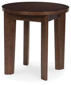 It-'s hard to say what-'s most striking about this round end table. Is it the rich warm brown finish or the thick tapered legs? Either way, the table-'s clean, contemporary aesthetic is perfect for your casual lifestyle. It would look perfect right next t