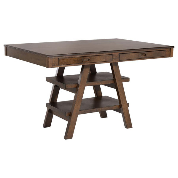 Entertain at this transitional counter height dining table, featuring ample seating space for up to six guests or family members. A rich walnut finish offers a neutral color palette and bold look to this furniture piece. With a raised counter height top, 