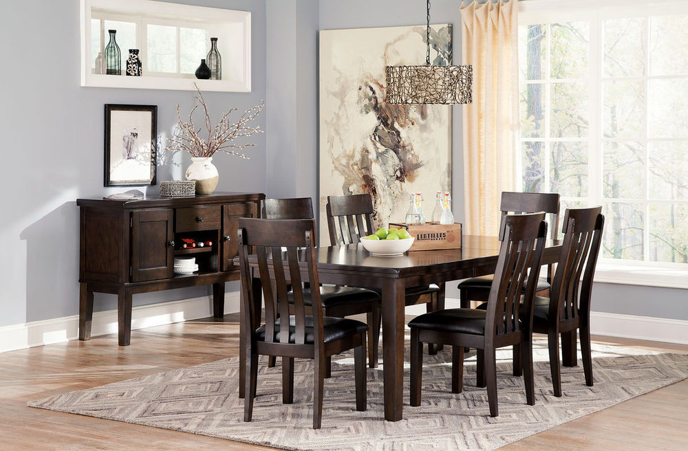 Made with select Oak veneers and hardwood solids with a dry smoky dark brown oak color. Edges and corners have a rounded off, worn effect for a casual look. Server has fully finished drawer boxes with ball bearing side guides. Sturdy looking knobs have de