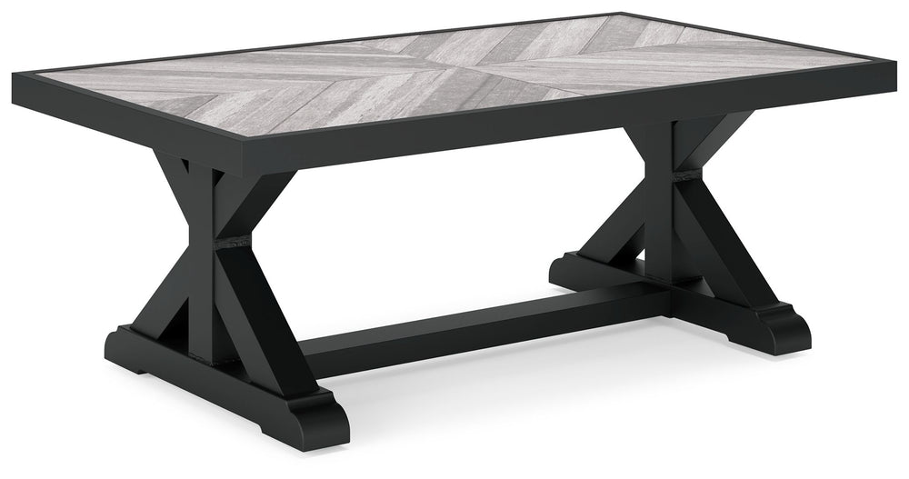 Sporting an easy-on-the-eyes elegance, this coffee table elevates the art of alfresco living. Beautiful and durable enough for indoor and outdoor use, this high-style/low-maintenance table charms with X-leg farmhouse styling. With a unique reverse diamond