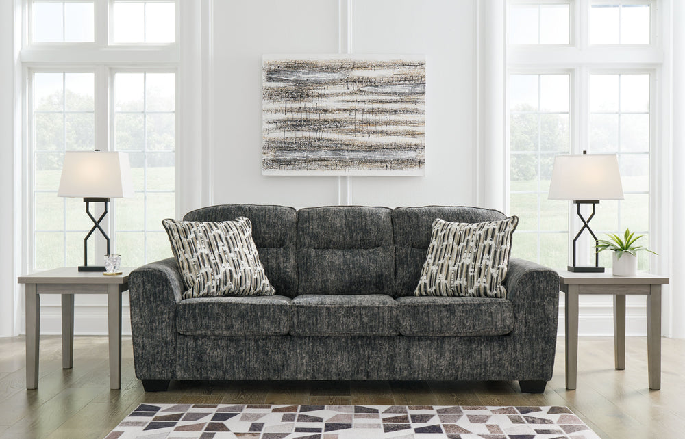 This sofa and loveseat set speaks to those drawn to fresh, contemporary style with richly neutral appeal. Subtle and sophisticated, the plush upholstery and dark tri-block legs are a natural complement for so many color schemes. Two accent pillows make th
