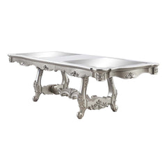 An ode to traditional glamour, the Devayne double pedestal dining table brings in all the allure and charm that you are seeking for a dining table. The table features an extension leaf that allows for additional dinner guests. The champagne finish enhance