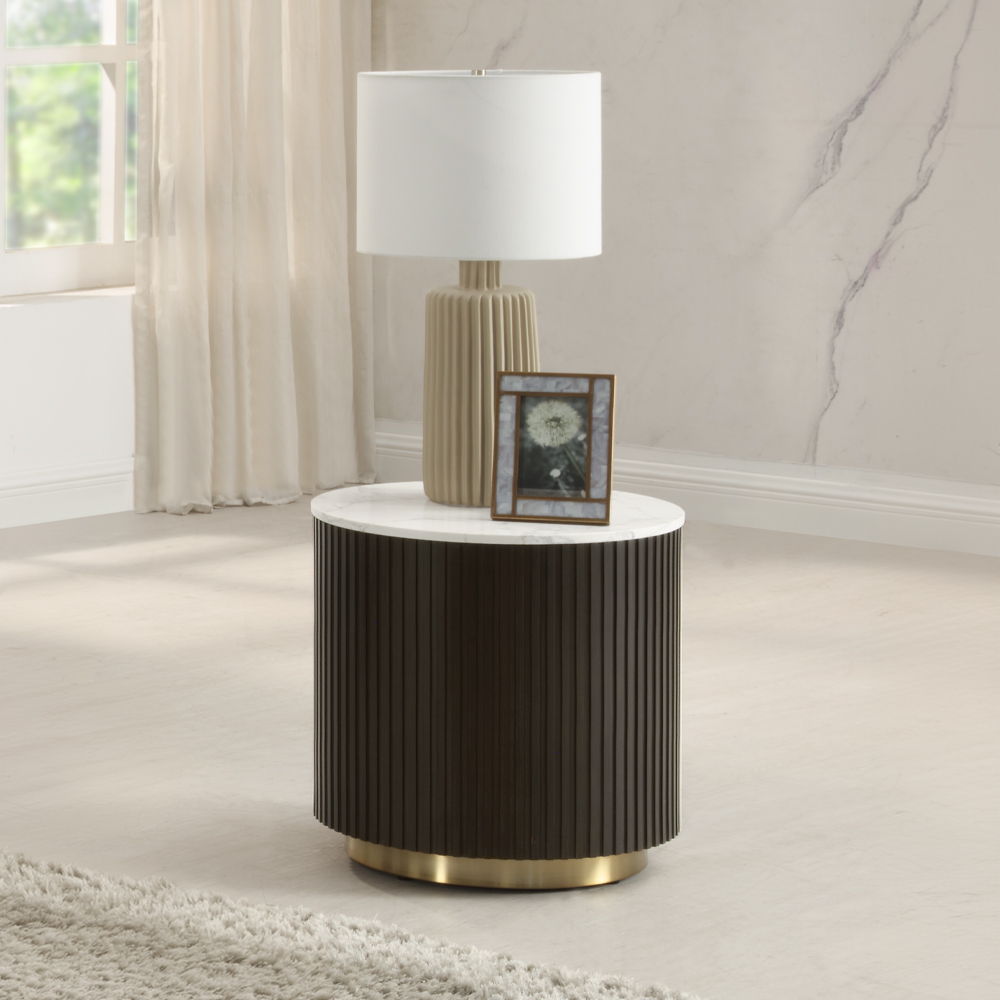 Elevate your living space with the Clayten table set, where modern design meets timeless elegance. Featuring luxurious marble tops and fixed table surfaces, each piece is accented with sleek metal trim for added sophistication. Perfect for contemporary ho