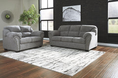 Everyone can have the best seat in the house with this sofa and loveseat. An indulgent choice with deep seats crafted for cloud-like softness, this set is the ideal merger of modern flair and classic staying power. <h4><b>Allmaxx - Pewter - Sofa</b></h4> 