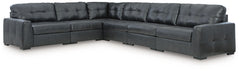 Discover lasting luxury with this sectional. You-'ll experience the perfect blend of comfort and stylish design with its combination of leather and faux leather. Featuring tufted detailing and low-profile legs, this must-have set ensures both coziness and
