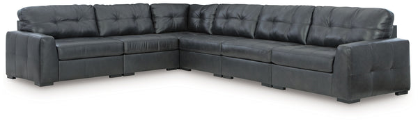 Discover lasting luxury with this sectional. You-'ll experience the perfect blend of comfort and stylish design with its combination of leather and faux leather. Featuring tufted detailing and low-profile legs, this must-have set ensures both coziness and