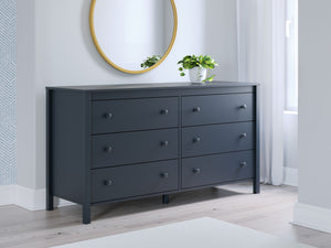  where Shaker-style design meets a stunning navy blue finish. The crisp lines effortlessly complement farmhouse