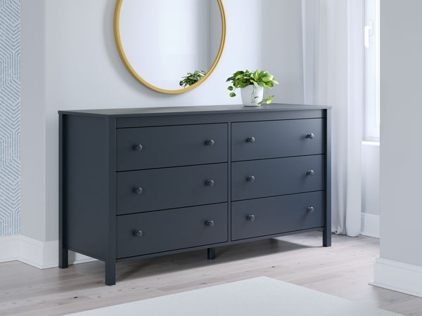  where Shaker-style design meets a stunning navy blue finish. The crisp lines effortlessly complement farmhouse