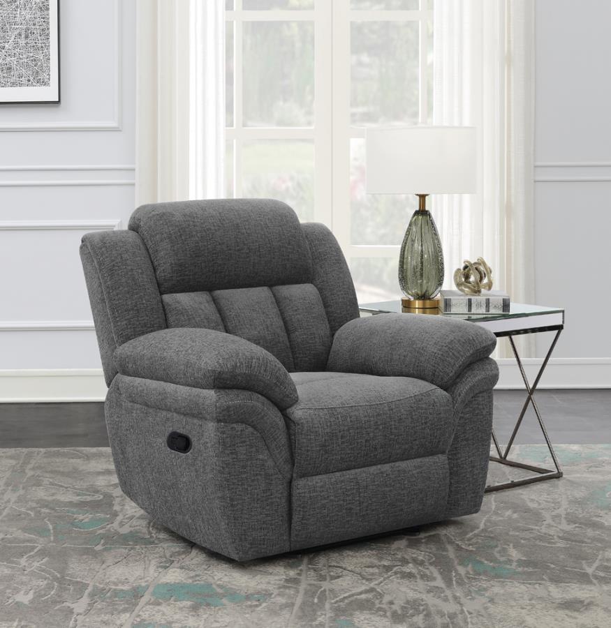 Wrapped in a charcoal grey performance chenille, this glider recliner is the perfect addition to a casual living room or man cave. As a manual recliner, this chair comes with a stay-in-place wall hugger mechanism that makes the most of a compact corner or