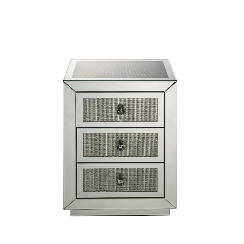 The Lavina occasional table brings glam styling to your home. The quality construction of this table features a combination of mirrored glass and composite wood, ensuring a design that endures. Three drawers with faux diamonds Inlay drawer fronts, It-'s j