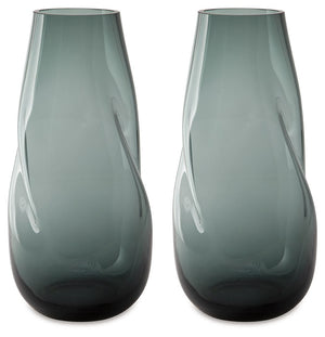 Sleek. Contemporary. Chic. This vase has an organic sense of movement, recalling seaside aesthetics with its teal glass. A stunning solo accent, it also acts as a beautiful vessel for florals and other decorative fillers. And the vase is safe for outdoor 
