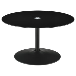 This modern coffee table showcases a sleek round design with a black tempered glass top, offering durability and style. The metal tulip base features a black powder-coated finish, creating a seamless and contemporary aesthetic. Perfect for living room set