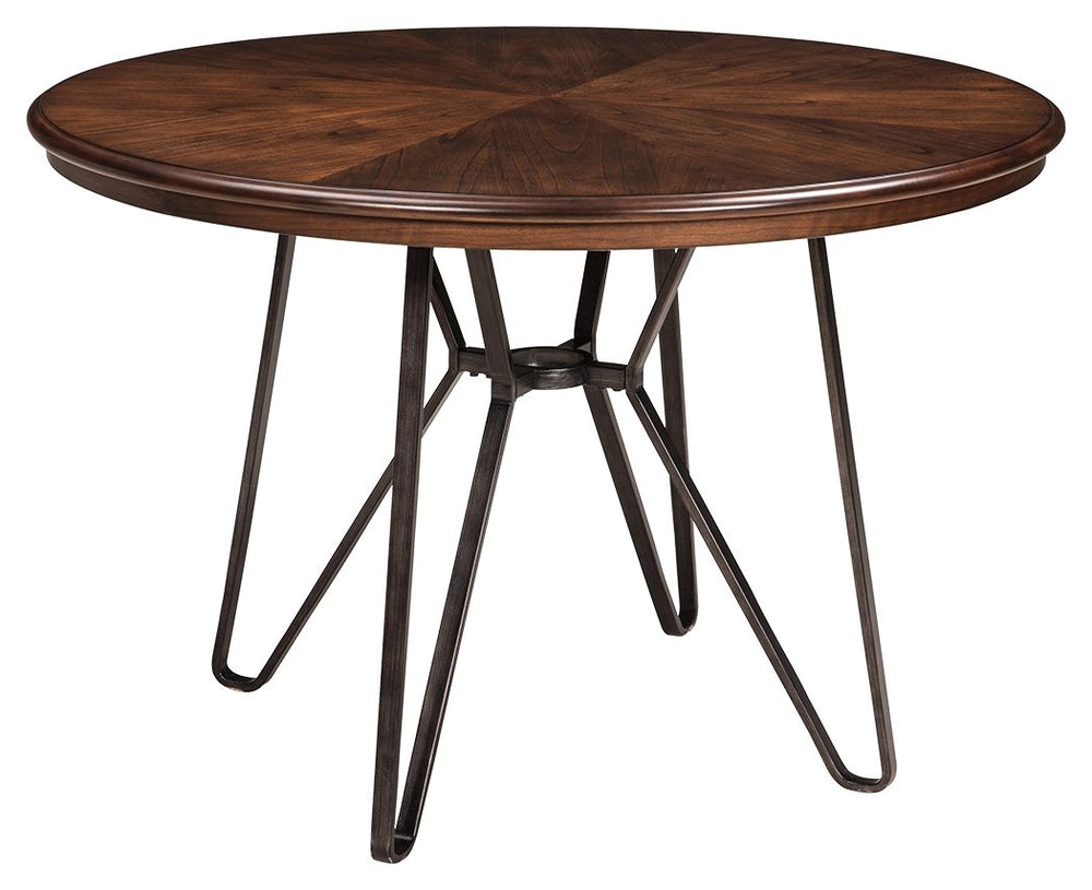 With its distinctive tubular metal base, this dining table serves up a fresh twist on mid-century inspired style. The mixed materials and two-tone aesthetic are beautifully in balance. What a timeless look for eat-in kitchens and casually cool dining room